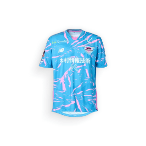 Sagan Tosu Home Football Shirt 2025, vibrant blue base colour shirt with a pink intricate pattern design, the club crest and branding logo on the chest and the main sponsor logo in the centre of the shirt, on a white background - shop now